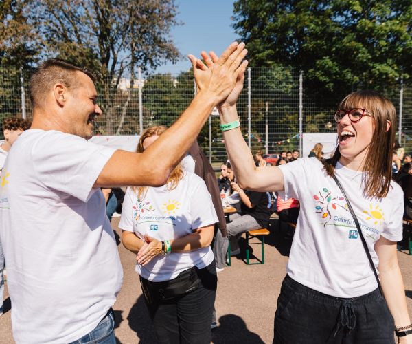 PPG Colorful Communities volunteers high five