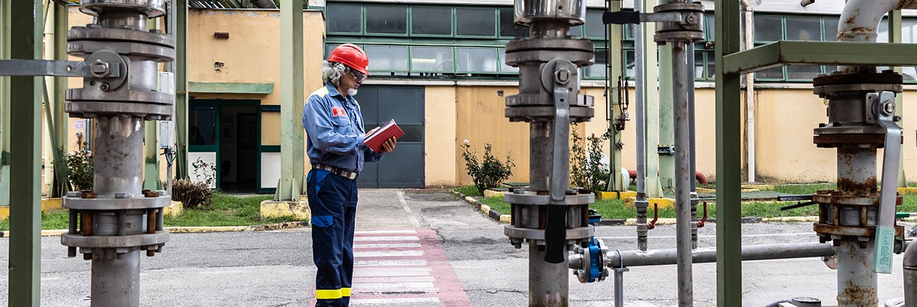 Worker in plant setting.