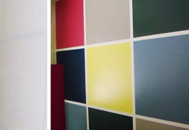 wall painted in a grid of colors