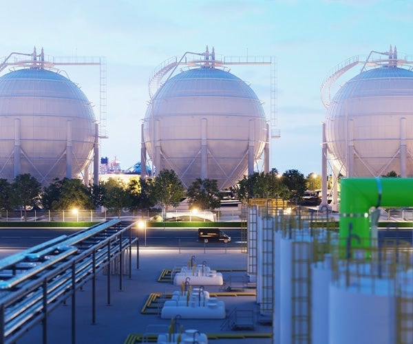 A large white spherical tanks