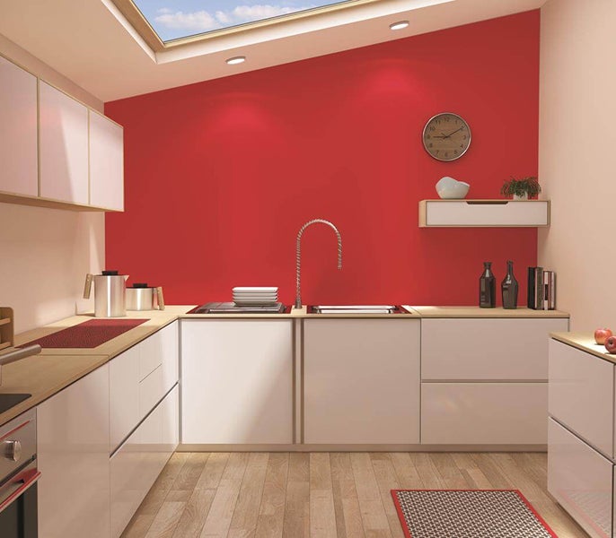 A kitchen with a skylight