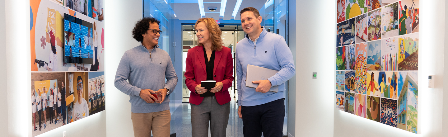 Employees in hallway