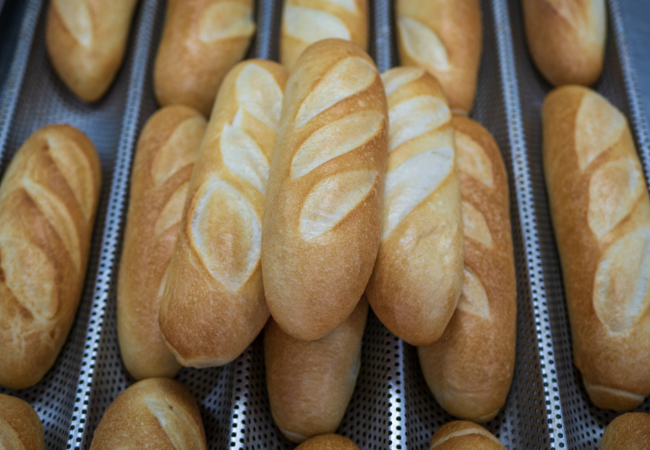 Bread cooling on a powder coated bread baking sheet.