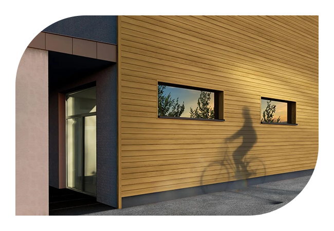 A shadow of a person on a bicycle