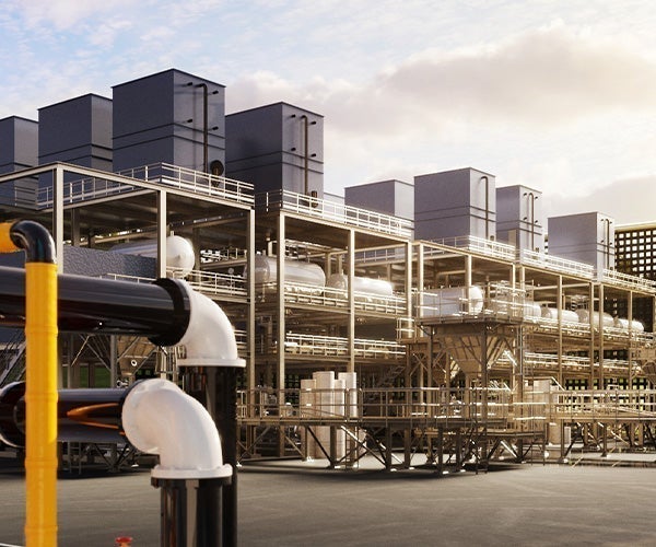 A large industrial building with pipes