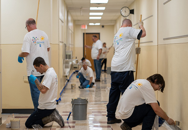 group of people painting hallway tan Oklahoma City, Oklahoma 