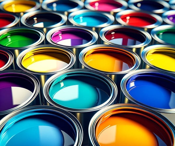 Rows of paint cans filled with brightly colored paint