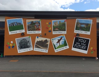 A wall with pictures on it