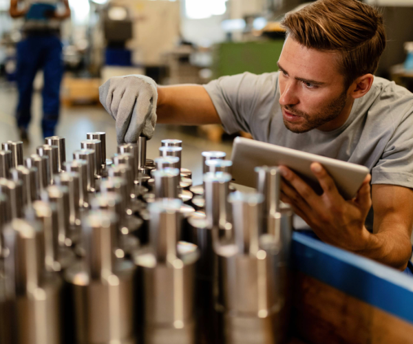 Man inspecting metal studs