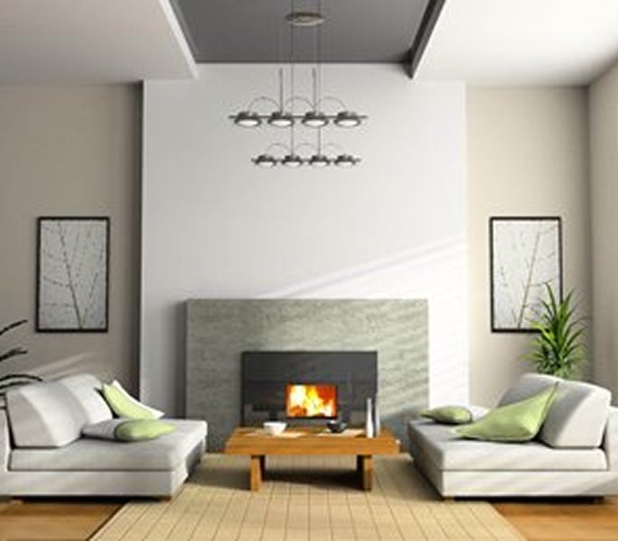 A living room with a fireplace and couches