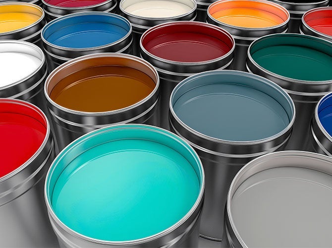 Open cans showing a variety of paint colors