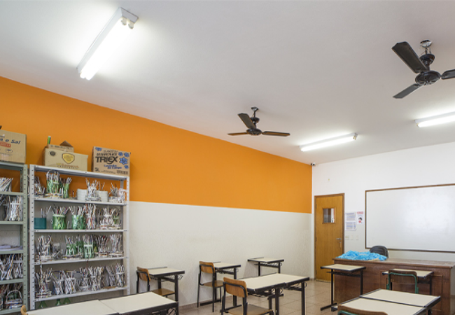 Classroom with orange colored wall 