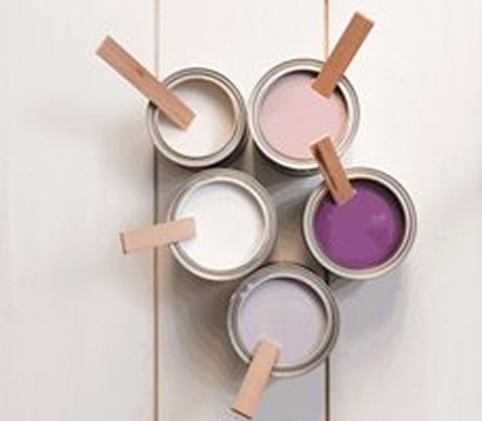 Paint cans with paint on them