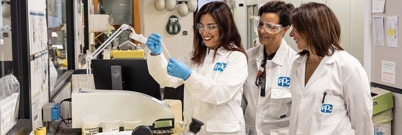 Female PPG workers in laboratory