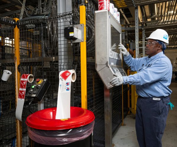 Man working in paint plant