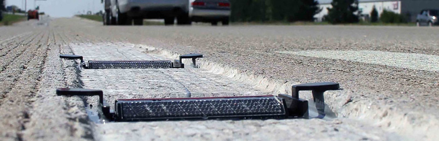 Raised pavement markers on a road