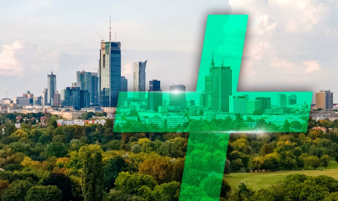 Sustainability skyline in Poland with a green plus symbol overlay