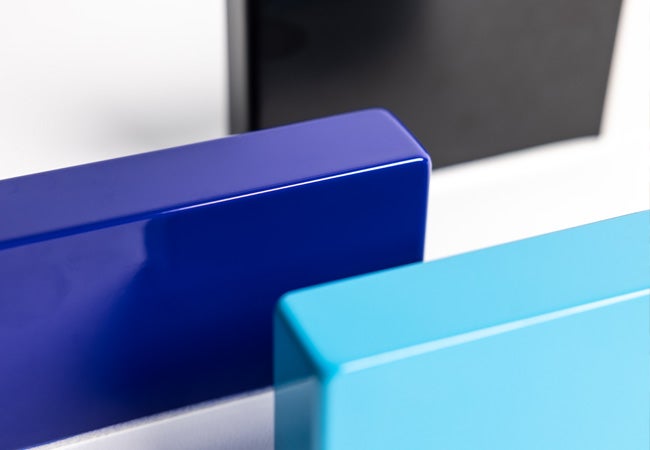 Metal components coated with a range of blue powder coatings