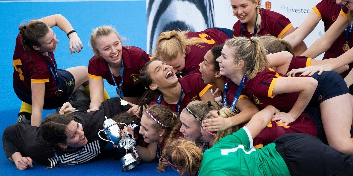 Girls Schools Championships - Girls smiling and laughing after winning 