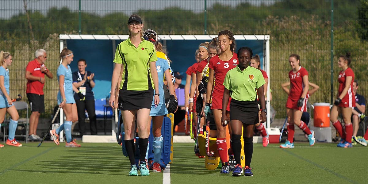 Two young female umpires at hockey futures cup