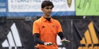 Young male umpire at England Hockey Championships 