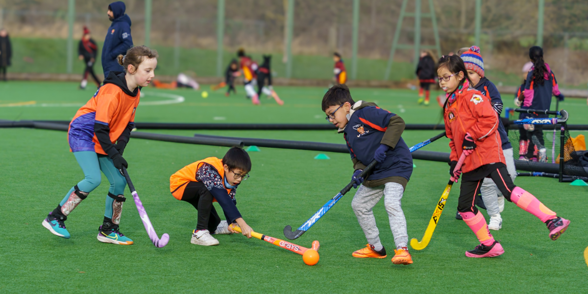 Children playing hockey