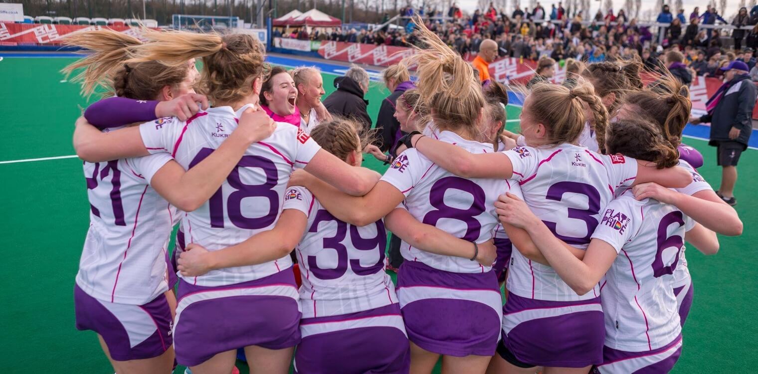 female players huddle