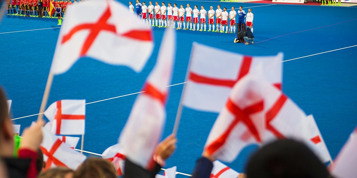 England Flags waving at a Hockey Event 