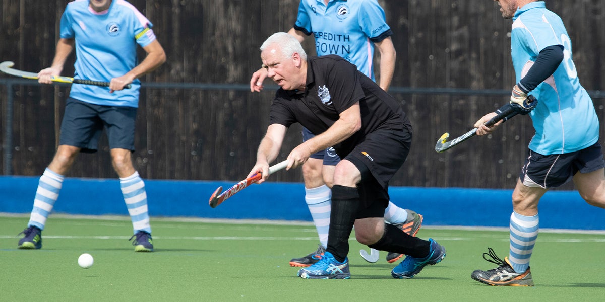 Masters - Male playing hockey at England Hockey Championships 