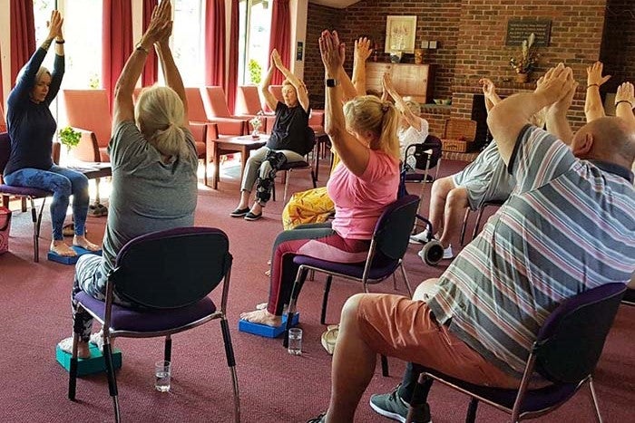 Residents participating on yoga session.