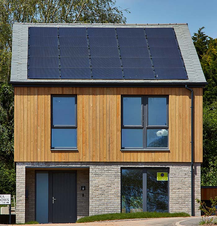 A modern detached house with solar panels