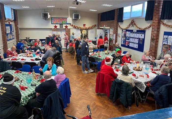 People attending a festive community event