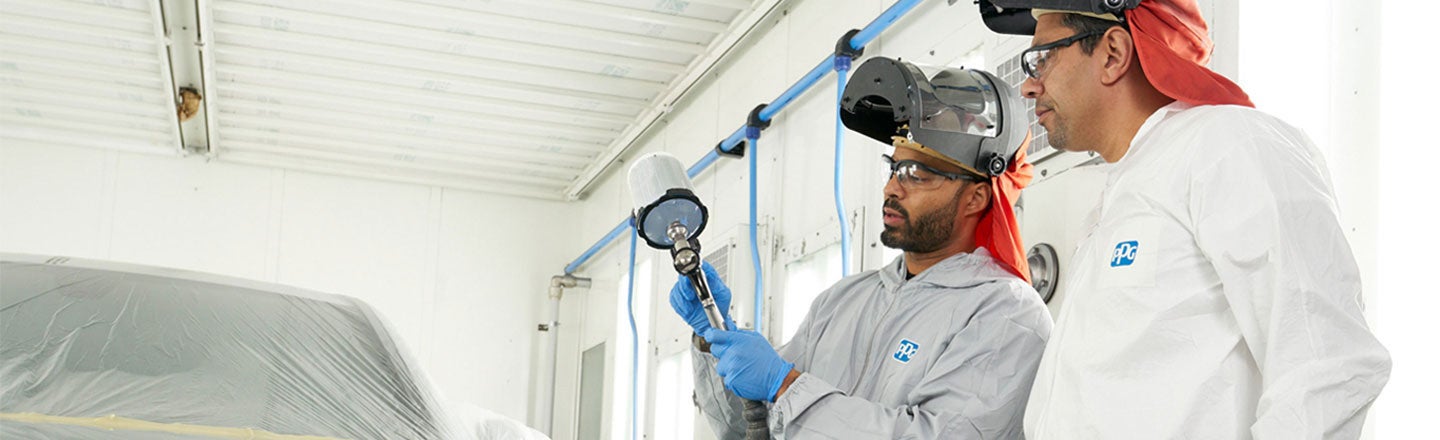 Training being carried out using spray guns