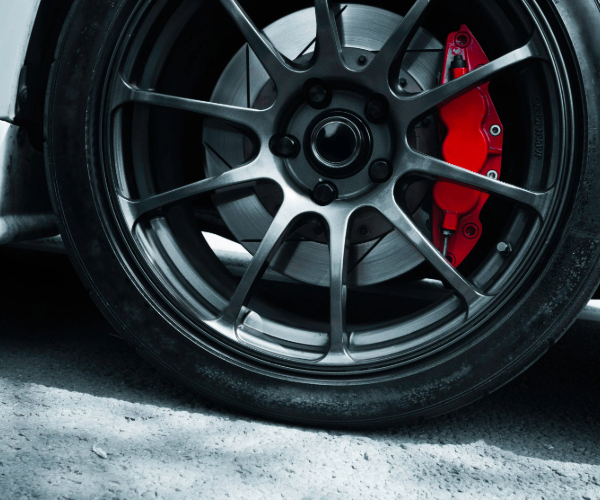 Close up image of a car wheel and tyre