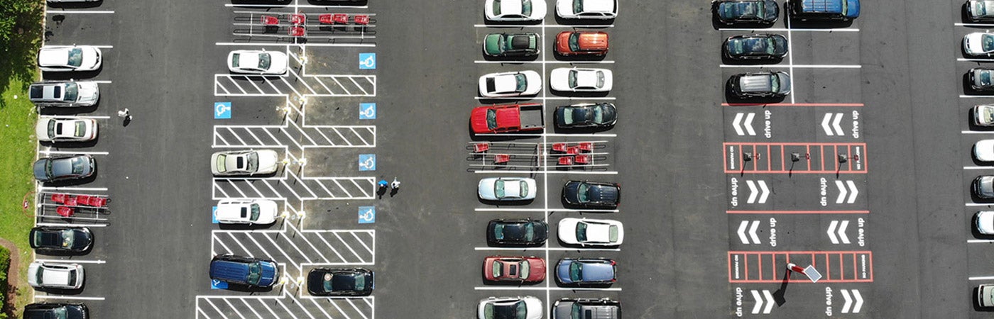 A parking lot with painted parking spaces