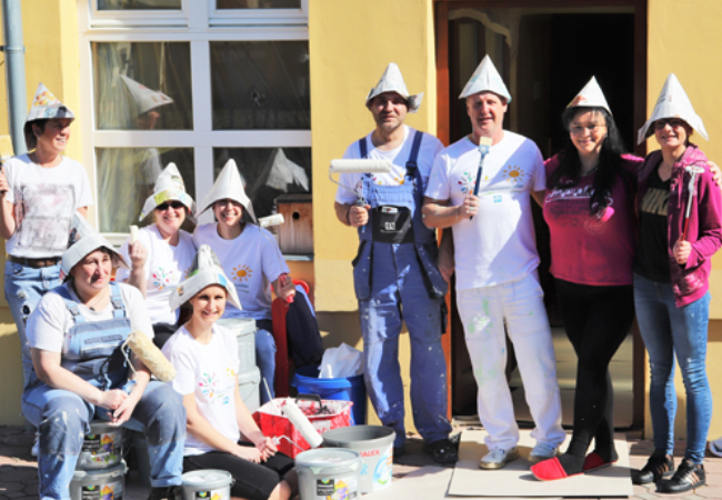 group of painters wearing hats