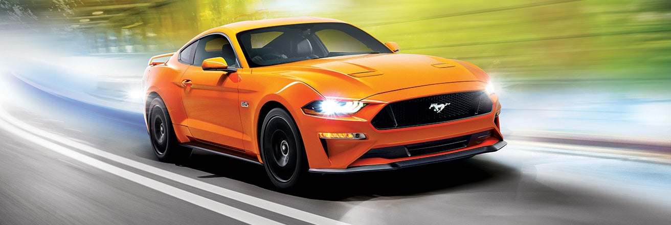 Ford Mustang coated in orange paint