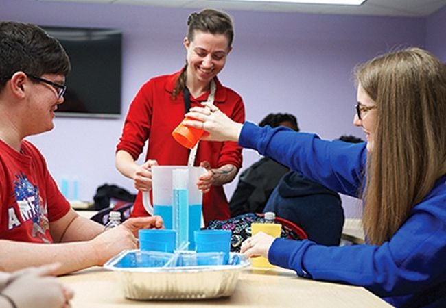 students experimenting in classroom