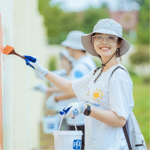 woman painting wall