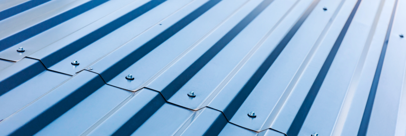 Blue roof panels fixed with nuts and bolts