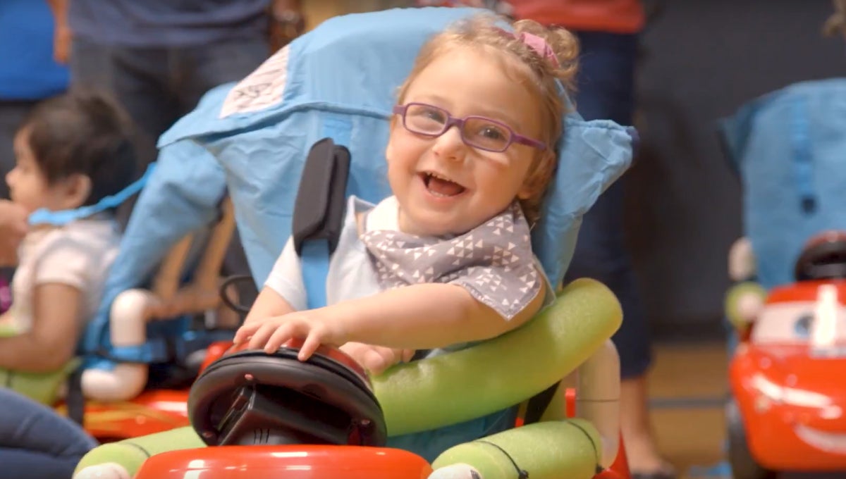 child In California, working with robotics with the PPG Foundation 