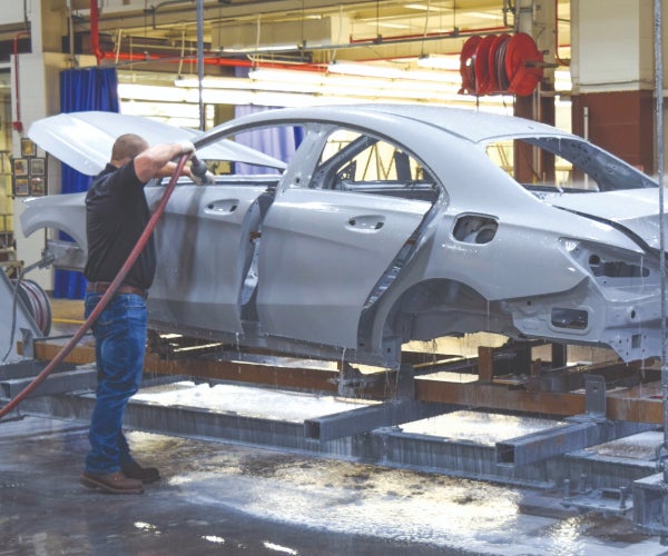 Daimler car body shell on an electrocoat line