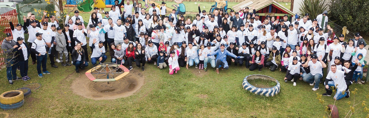 PPG employees in group photo during Colorful Communities program