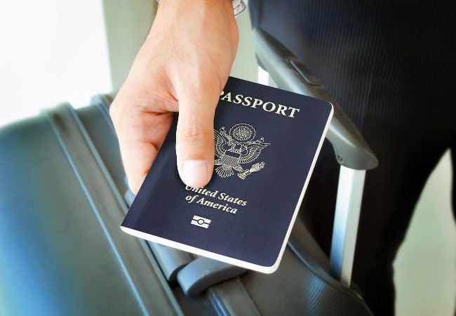 hand holding passport