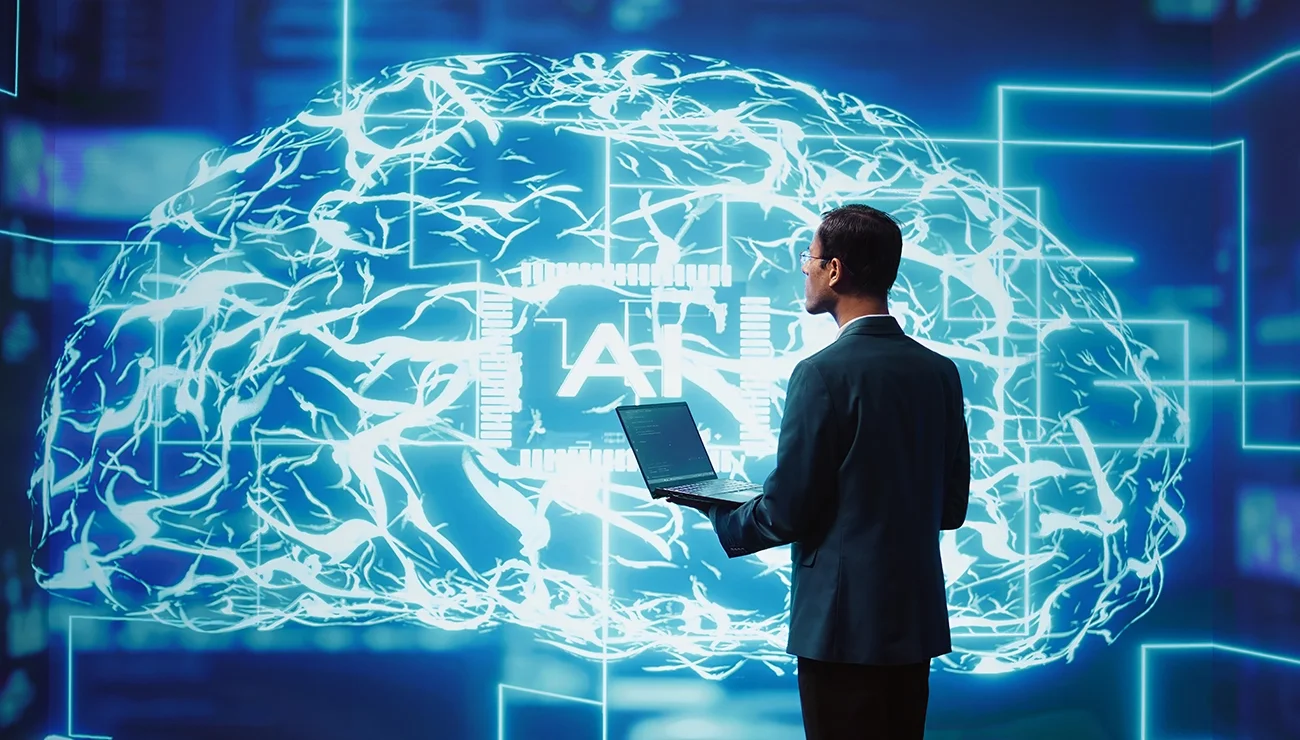 Systeembeheerder werkt op laptop aan AI die het menselijk brein simuleert