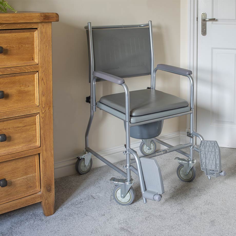 Wheeled commode chairs
