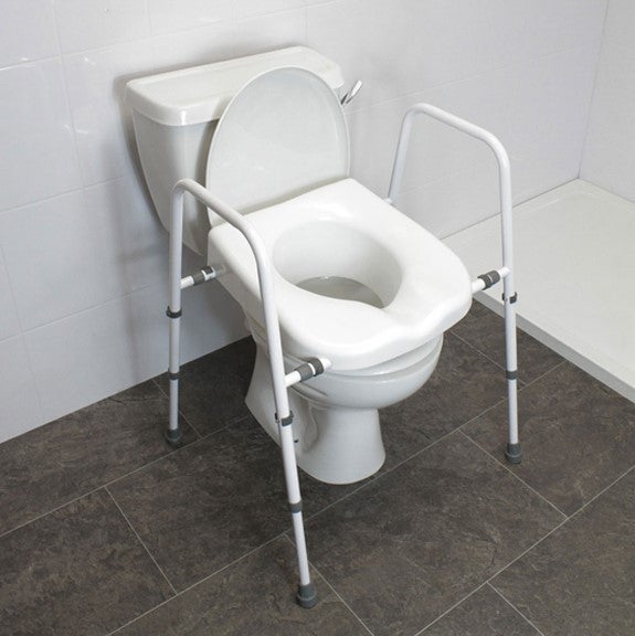 Toilet seat with frame