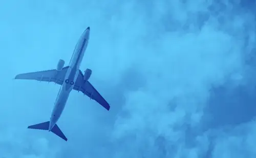 an airplane soars through the clouds. It is glorious.
