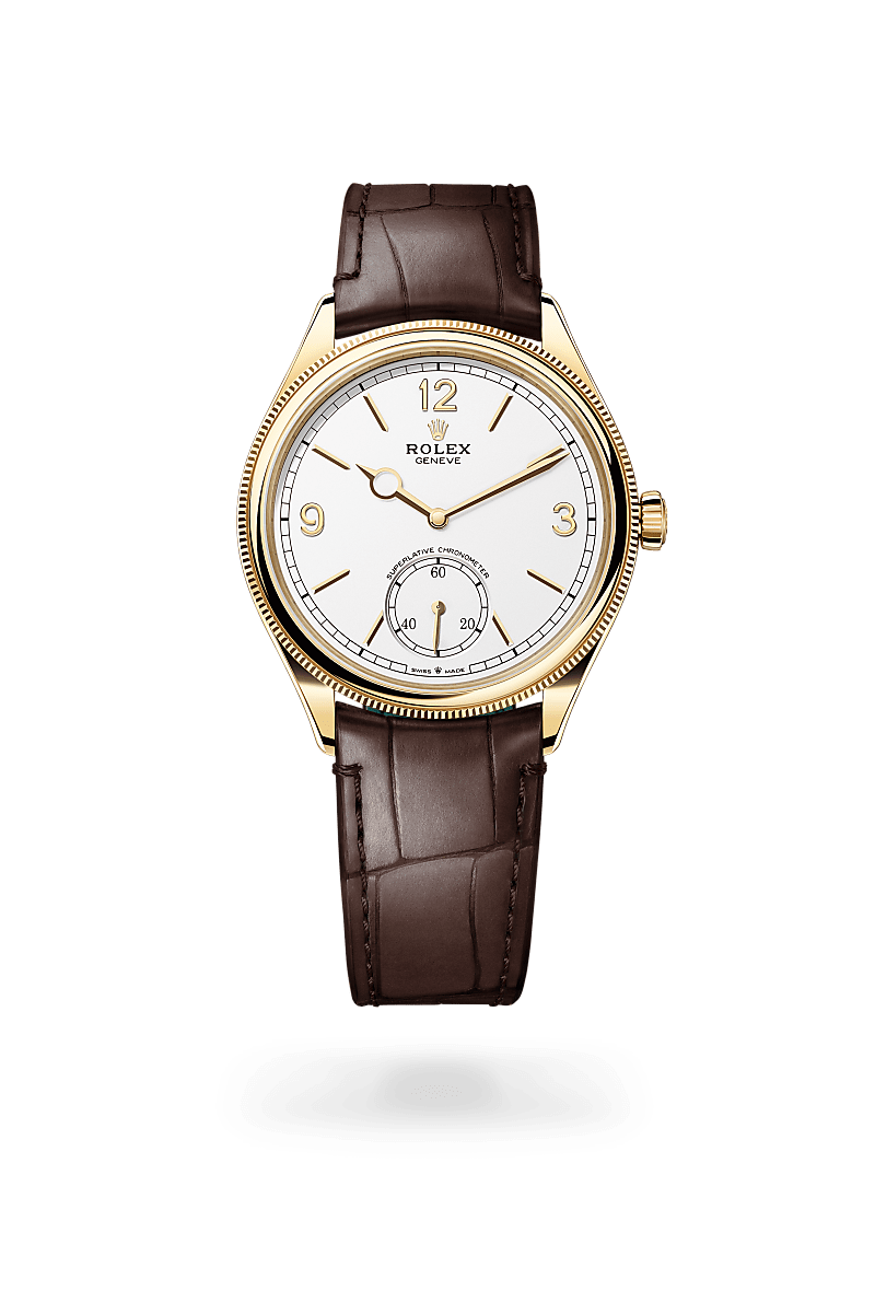 Rolex 1908 in 39 mm, 18 ct yellow gold, polished finish with a Intense white dial, Domed and fluted bezel, and Leather strap bracelet