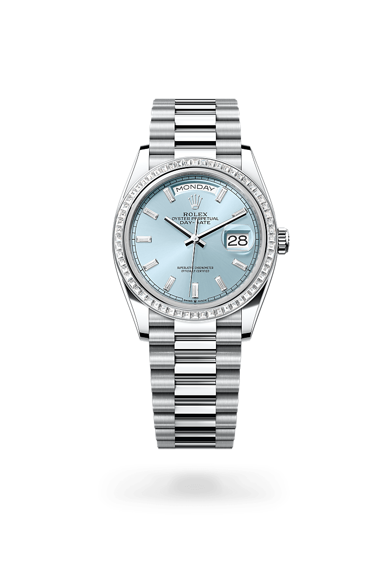 Rolex Day-Date 36 in Oyster, 36 mm, platina en diamanten with a IJsblauw bezet met diamanten dial, Bezet met diamanten bezel, and President, halfronde driedelige schakels bracelet